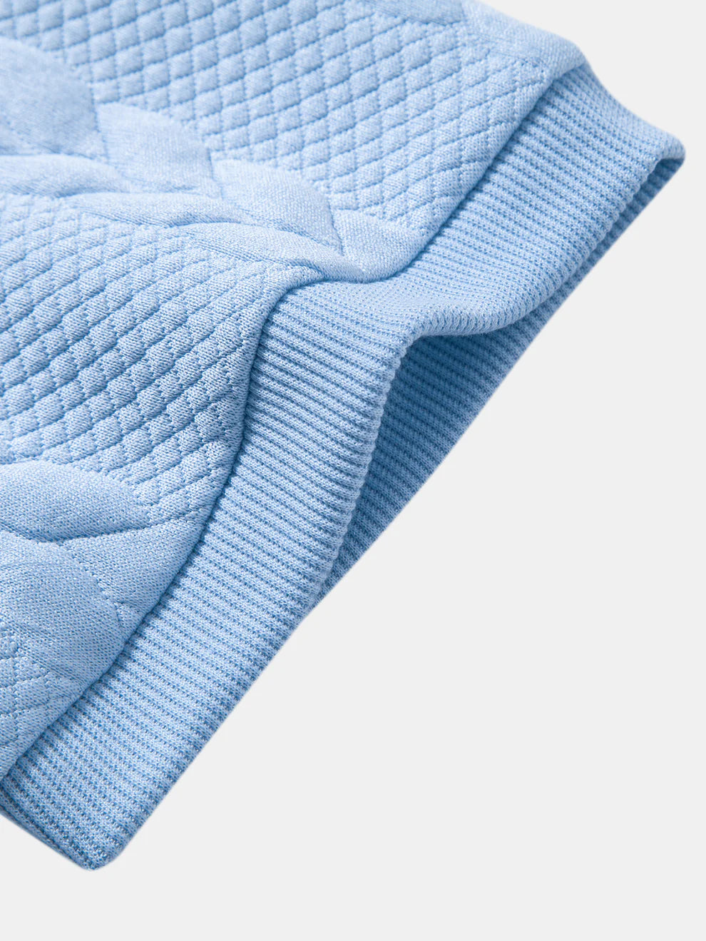 Polo de cuello en V de jacquard retorcido