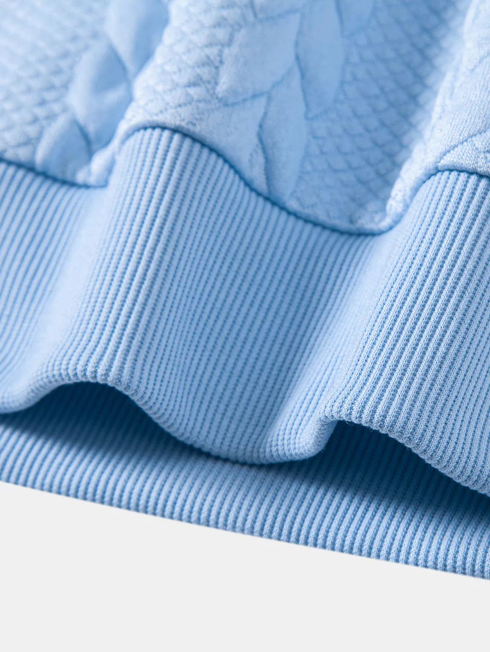 Polo de cuello en V de jacquard retorcido